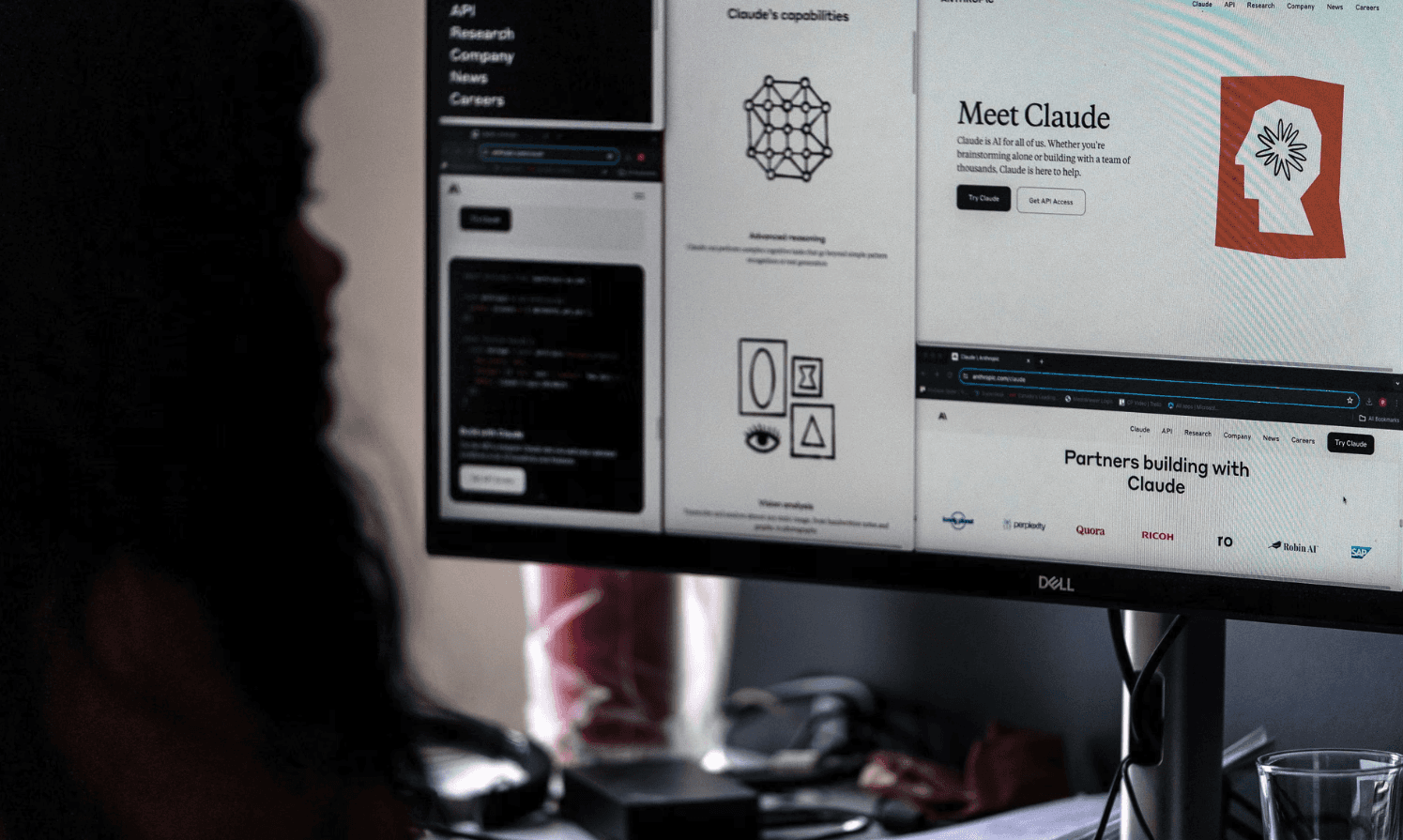 Person learning Claude and AI tools in a ReIntellex training session